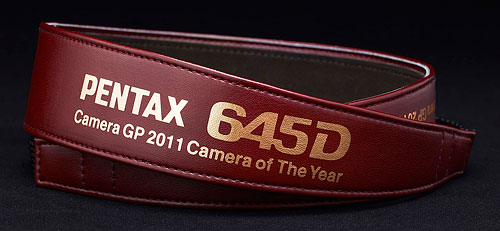 The 645D Japan includes a customized synthetic leather strap, shown above. The product bundle also includes a focusing screen and body mount cap that differ from those bundled with the standard version 645D. Photo provided by Pentax Imaging Co. Click for a bigger picture!