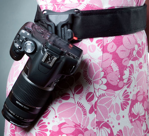 Canon digital SLR attached to the Black Widow camera holster. Photo provided by Shai Gear LLC. Click for a bigger picture!