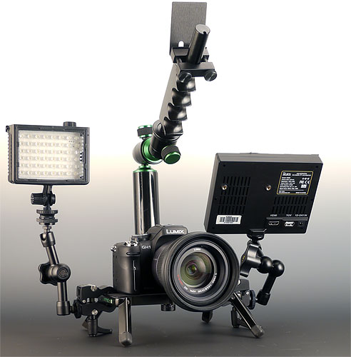 The Camtrol Grand system, shown with Panasonic Lumix DMC-GH1 digital camera and 14-140mm lens mounted. Also attached are an Ikan V5600 5.6-inch HDMI LCD and an unidentified LED video light, each mounted via optional 4-inch Camtrol articulating arms. Photo provided by Camtrol LLC. Click for a bigger picture!