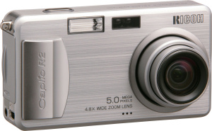 Ricoh's Caplio R2 digital camera. Courtesy of Ricoh, with modifications by Michael R. Tomkins. Click for a bigger picture!