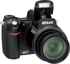 Nikon's Coolpix 8800 digital camera. Courtesy of Nikon, with modifications by Michael R. Tomkins. Click for a bigger picture!