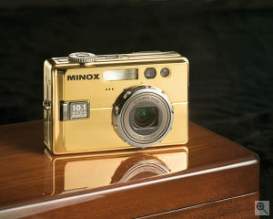 Minox's DC 1011 Carat digital camera. Courtesy of Minox, with modifications by Michael R. Tomkins. Click for a bigger picture!