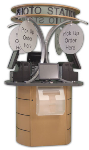 DNP Photo Imaging America's Multi-station Photo Kiosk. Courtesy of DNP Photo Imaging America, with modifications by Zig Weidelich.