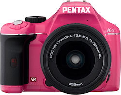 The pink version of the Pentax K-x digital SLR with 18-55mm kit lens. Photo provided by Pentax Imaging Co. Click for a bigger picture!