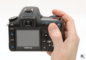 Pentax's K100D digital SLR. Copyright &copy; 2006, The Imaging Resource. All rights reserved. Click for a bigger picture!