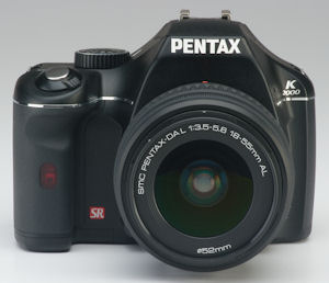 Pentax's K2000 digital SLR. Courtesy of Pentax, with modifications by Michael R. Tomkins. Click for a bigger picture!