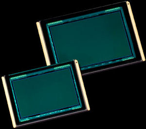 Leica's 'Pro Format' image sensor (right), shown with an unidentified 35mm full-frame imager for size comparison. Courtesy of Leica, with modifications by Michael R. Tomkins. Click for a bigger picture!