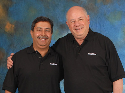 SanDisk President and COO, Sanjay Mehrotra, 52, and Chairman and CEO, Eli Harari, 65, (left to right). Today, SanDisk announced the planned retirement of Harari, who stays on with the company as chairman and CEO through the rest of 2010, and Mehrotra as President and CEO successor, effective January 1, 2011. Harari also remains an advisor with the company for two years as of January 1, 2011. Photo and caption provided by SanDisk Corp. Click for a bigger picture!