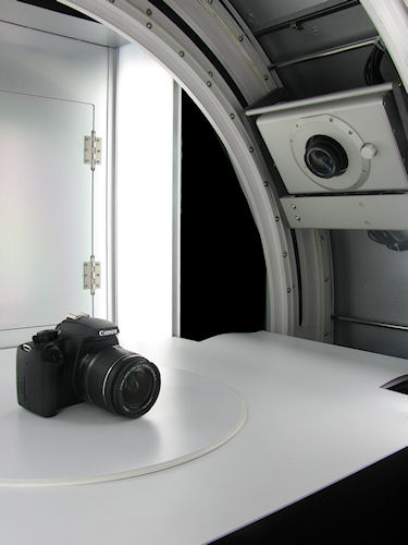 Inside the Photosimile 5000, showing the camera platter and turntable with subject. Photo provided by Ortery Technologies. Click for a bigger picture!
