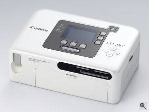 Canon's SELPHY CP730 digital camera. Courtesy of Canon, with modifications by Michael R. Tomkins. Click for a bigger picture!