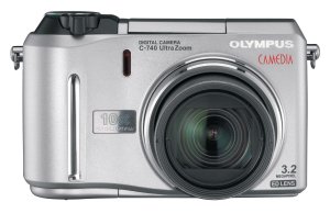Olympus' C-740 Ultra Zoom digital camera. Courtesy of Olympus, with modifications by Michael R. Tomkins. Click for a bigger picture!