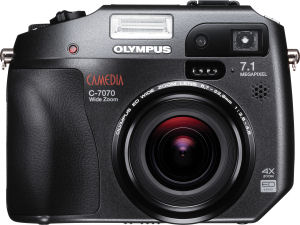 Olympus's Camedia C-7070 Wide Zoom digital camera. Courtesy of Olympus, with modifications by Michael R. Tomkins. Click for a bigger picture!