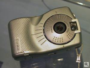 Konica's E-Mini digital camera, front view. Copyright (c)  2001, Michael R. Tomkins. All rights reserved. Click for a bigger picture!