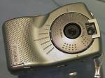 Konica's E-Mini digital camera, front view. Copyright (c) 2001, Michael R. Tomkins, all rights reserved.