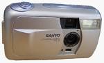Sanyo's VPC-R1 digital camera. Courtesy of LetsGoDigital.nl with modifications by Michael R. Tomkins.