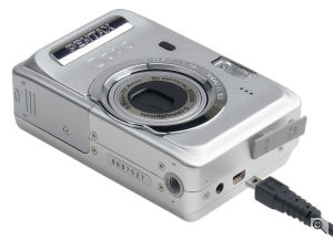 Pentax's Optio S55 digital camera. Courtesy of Pentax, with modifications by Michael R. Tomkins. Click for a bigger picture!