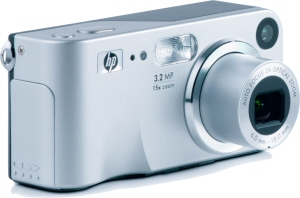 HP's Photosmart M307 digital camera. Courtesy of Hewlett Packard, with modifications by Michael R. Tomkins. Click for a bigger picture!