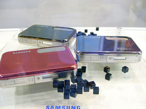 Samsung's Digimax i5 digital camera. Courtesy of Samsung, with modifications by Michael R. Tomkins. Click for a bigger picture!