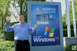 Bill Gates, chairman and chief software architect of Microsoft, with a master code disk of Windows XP. Courtesy of Microsoft, Photo by Jeff Christensen. Click for a bigger picture!
