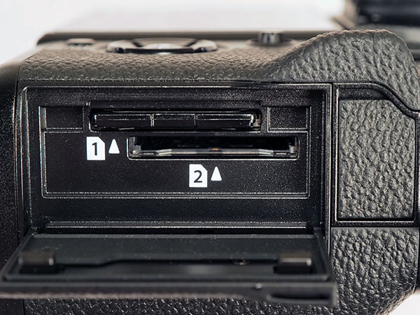 Canon EOS R Review -- extreme close-up of memory card compartment door hinge.