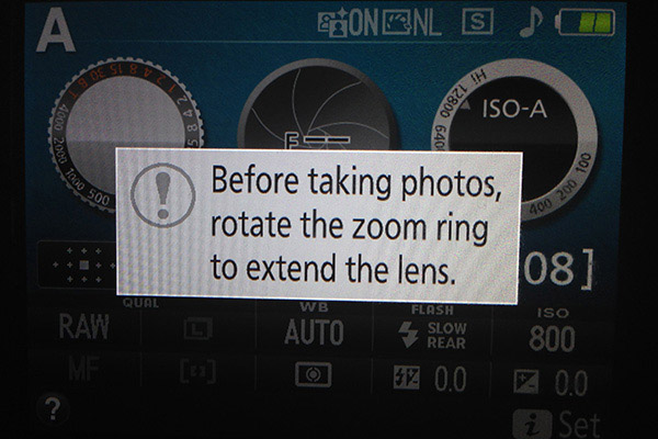 Nikon D3300 Review -- Screenshot reminder to extend the lens