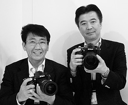 Nikon's Kenji Suzuki and Toshiaki Akagi. Copyright &copy; 2012, Imaging Resource. All rights reserved. Click for a bigger picture!