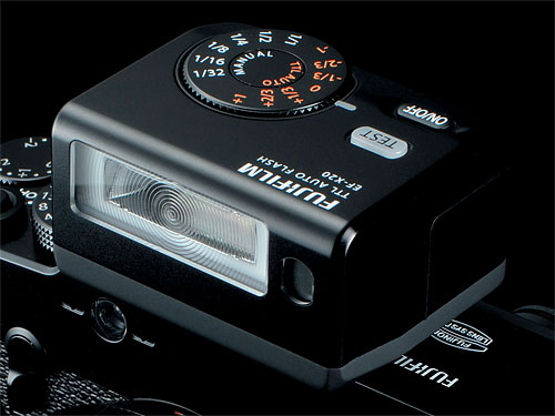 The EF-X20 flash strobe mounted on Fujifilm's X-Pro1 compact system camera. Photo provided by Fujifilm Corp. Click for a bigger picture!